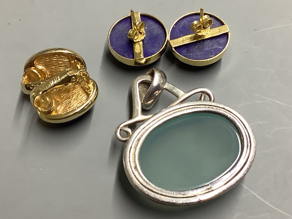 A pair of 18ct gold and lapis lazuli cabochon stud earrings, gross 7.4 grams, a pair of Dior earrings and an oval hardstone pendant